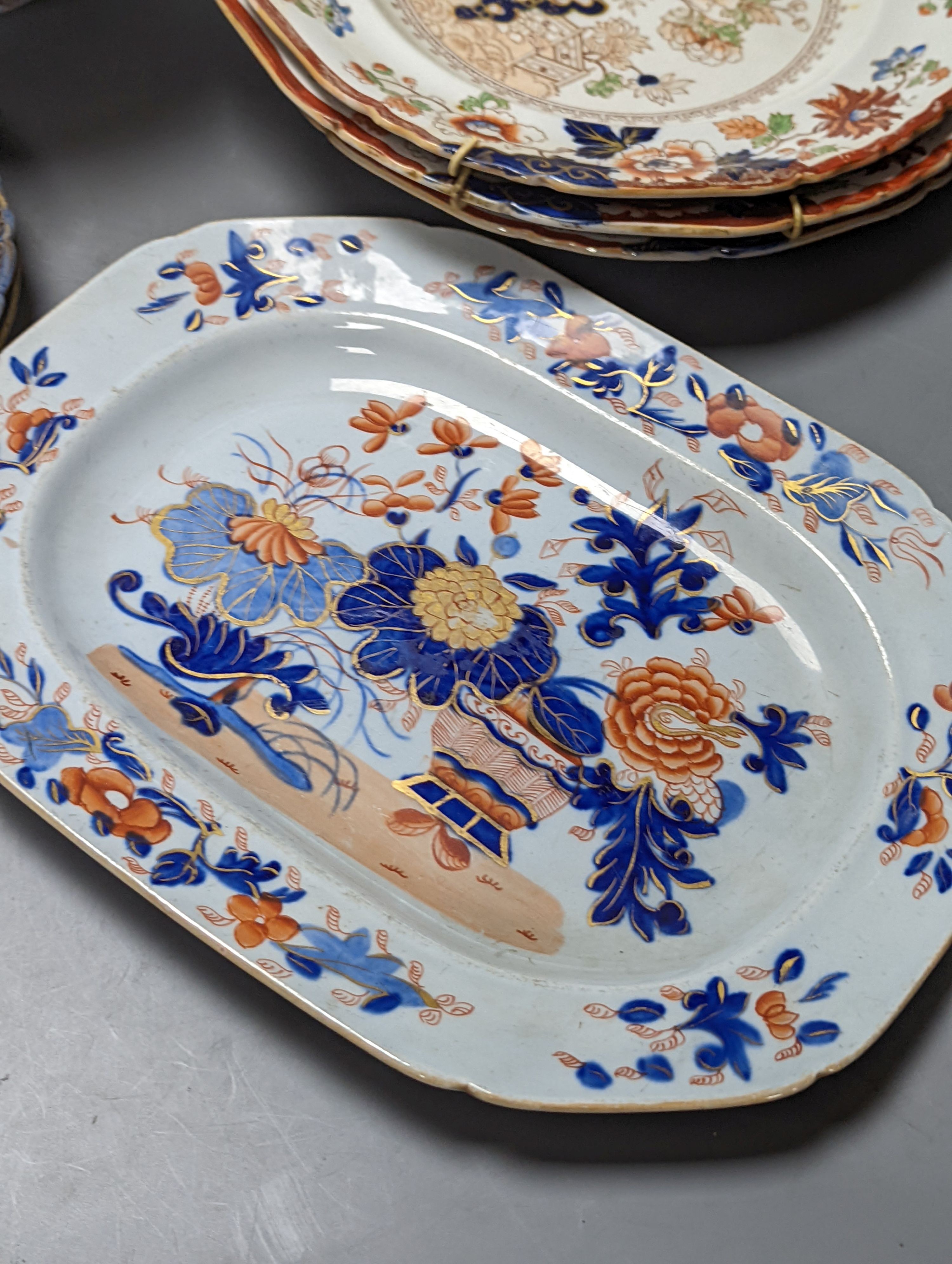 Three Masons plates, a similar platter, two armorial plates and a Japanese bowl, stoneware platter 29 cms wide.
